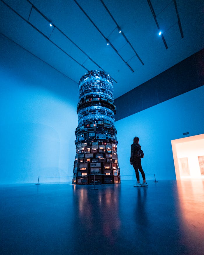 Person Inside A Building Looking At A Structure